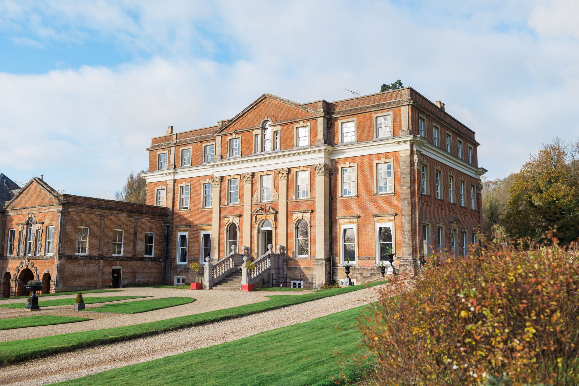 The front facade and grand staircase of Crowcombe Court