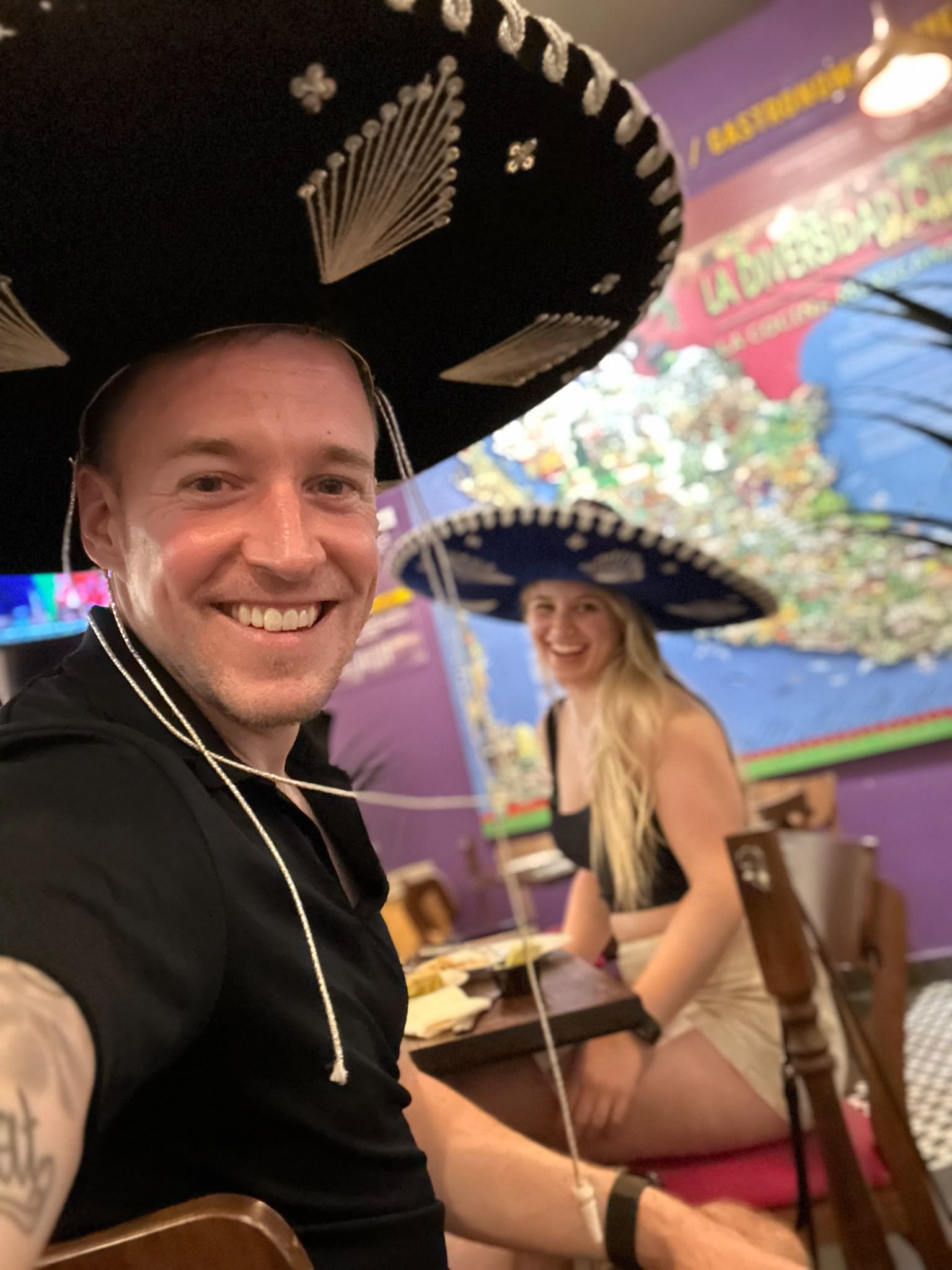 Luther and Alice enjoying a colourful costume party