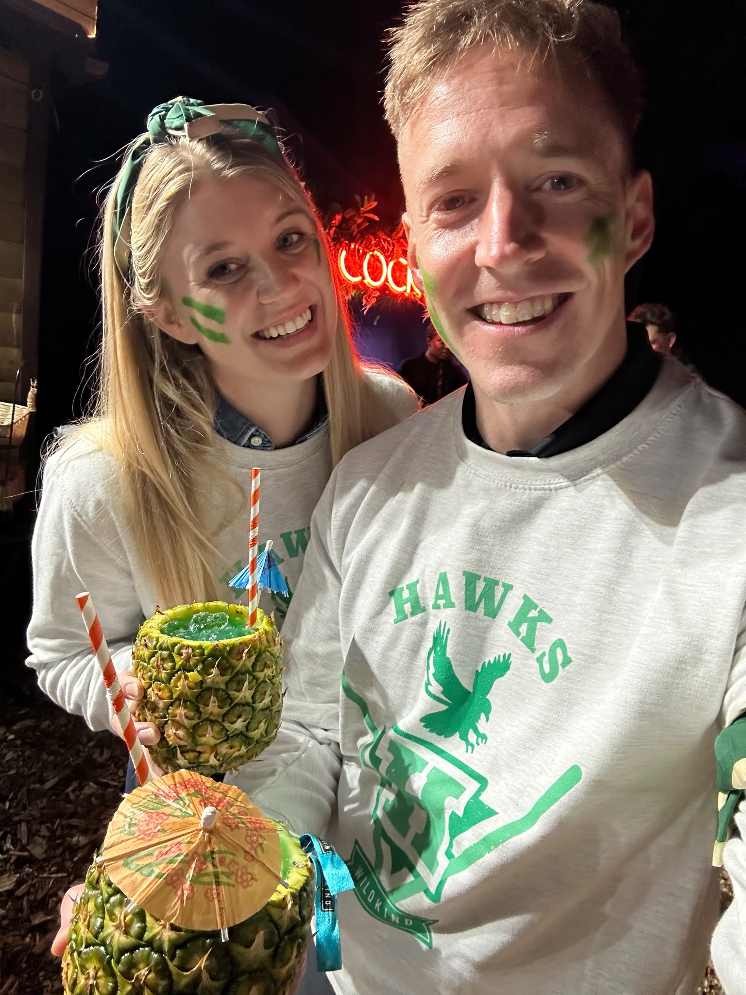 Luther and Alice enjoying a tropical-themed party